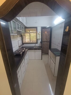 Kitchen in 2.5 BHK Apartment at Seawoods Sector 42a – for Rent