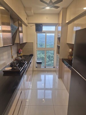 Kitchen in 3.5 BHK Apartment at VR Bhoomi Acres F Wing, Ghodbunder Road – for Rent