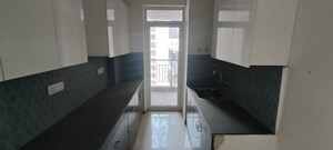 Kitchen in 3 BHK Apartment at Pareena Express Heights, Sector 99 – for Rent