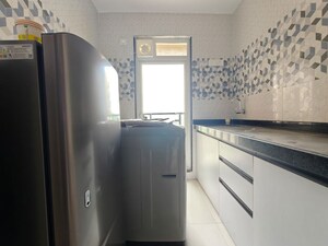 Kitchen in 1 BHK Apartment at Raunak Bliss, Ghodbunder Road – for Rent