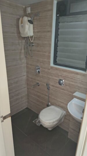 Bathroom in 3 BHK Apartment at Godrej Emerald, Ghodbunder Road – for Rent