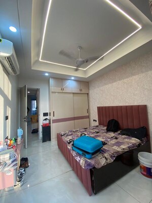 Bedroom in 3 BHK Builder Floor at Ansal Palam Triangle, Palam Vihar Extension – for Rent