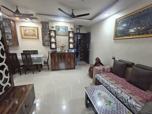Living Room in 2 BHK Apartment at Dosti Planet North, Shilphata – for Sale