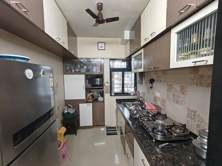 Kitchen, dosti-planet-north 2 Bedroom 670 Sq.Ft. Apartment In Shilphata Thane 10568646