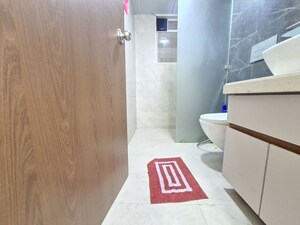Bathroom in 2 BHK Apartment at Dosti West County Phase 4 Dosti Pine, Balkum Pada – for Rent
