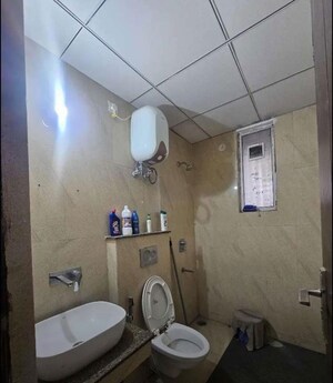 Bathroom in 3 BHK Apartment at Affinity Greens, International Airport Road – for Rent