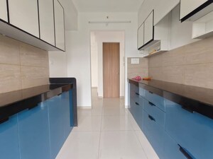 Kitchen in 2 BHK Apartment at Godrej Emerald, Ghodbunder Road – for Rent