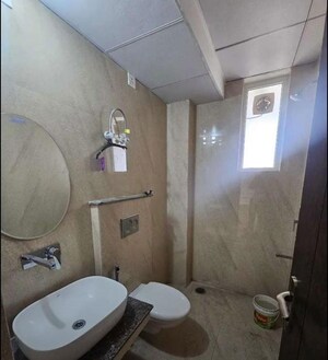 Bathroom in 3 BHK Apartment at Affinity Greens, International Airport Road – for Rent