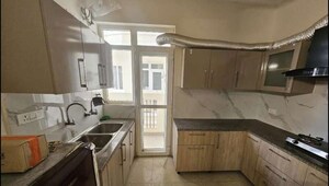 Kitchen in 3 BHK Apartment at Affinity Greens, International Airport Road – for Rent