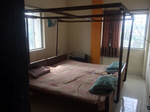 Bedroom in 2 BHK Apartment at Siddharth Apartment Bhusari Colony, Kothrud – for Rent