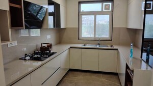 Kitchen in 4 BHK Builder Floor at BPTP Amstoria, Sector 102 – for Sale