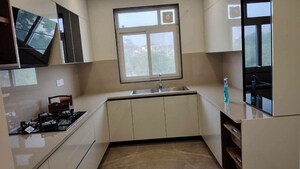 Kitchen in 4 BHK Builder Floor at BPTP Amstoria, Sector 102 – for Sale