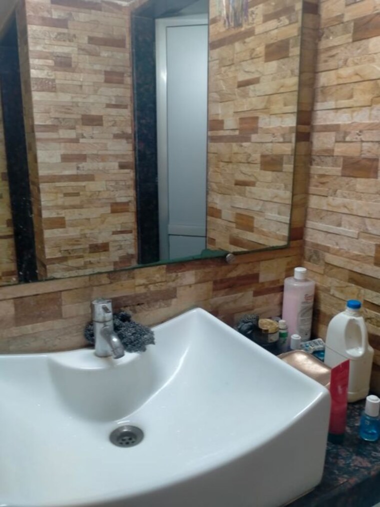 Bathroom, rushabh-tower-mira-road 1 Bedroom 715 Sq.Ft. Apartment In Mira Road Thane 10568721