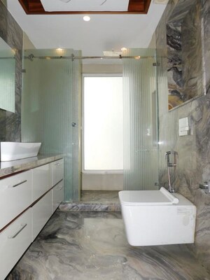 Bathroom in 4 BHK Builder Floor at Defence Colony – for Rent