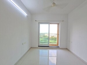 Bedroom in 2 BHK Apartment at Rustomjee Azziano Wing E, Thane West – for Rent
