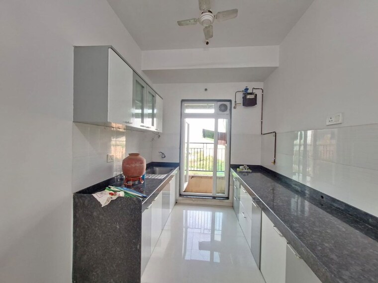 Kitchen, rustomjee-azziano-wing-e 2 Bedroom 848 Sq.Ft. Apartment In Thane West Thane 10568764