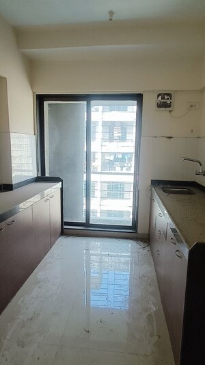 Kitchen in 2 BHK Apartment at Bhoomi Acropolis, Virar West – for Rent