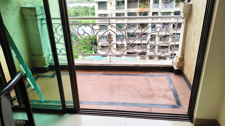 Balcony, tharwani-rosewood-heights 3 Bedroom 1500 Sq.Ft. Apartment In Kharghar Sector 10 Navi Mumbai 10568805