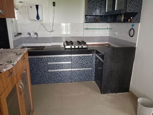 Kitchen in 2 BHK Apartment at Raj Heramb Nere Residency, Narhe – for Sale