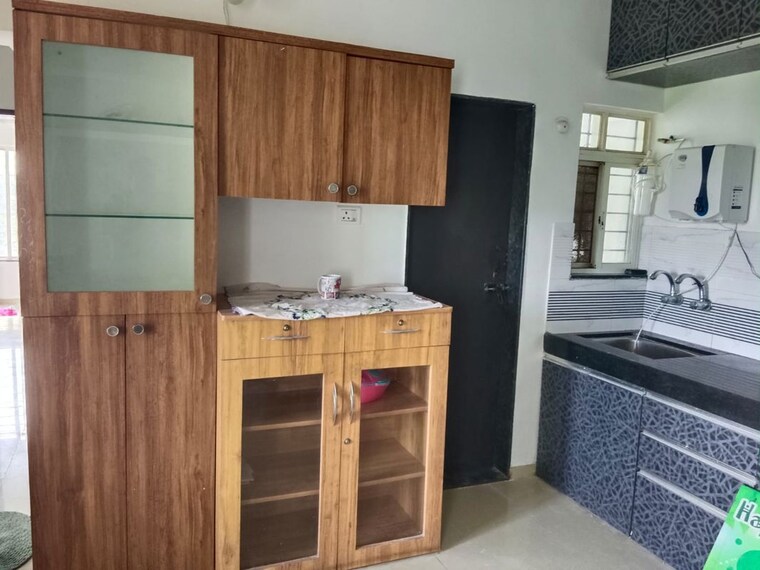 Kitchen, raj-heramb-nere-residency 2 Bedroom 900 Sq.Ft. Apartment In Narhe Pune 10568831