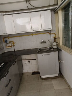 Kitchen in 2.5 BHK Apartment at Tulip Orange, Sector 70 – for Rent