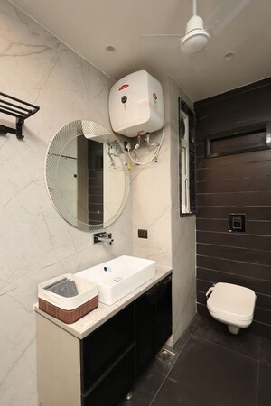 Bathroom in 3 BHK Builder Floor at Smart World Orchard, Sector 61 – for Rent