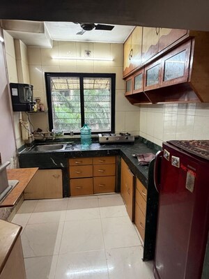 Kitchen in 1 BHK Apartment at Krishna Kunj CHS Kalyan, Kalyan West – for Sale