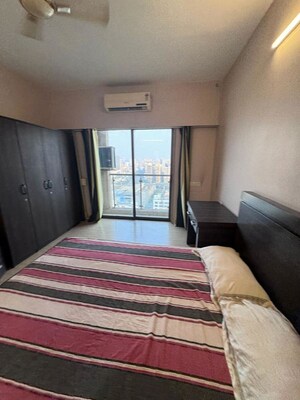 Bedroom in 3 BHK Apartment at HDIL Metropolis Residences, Andheri West – for Rent