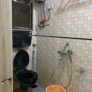 Bathroom in 2 BHK Apartment at Yogananda CHS, Borivali West – for Rent