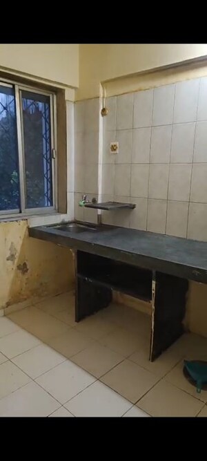 Kitchen in 1 BHK Apartment at Purushottam Plaza, Kasarvadavali – for Rent