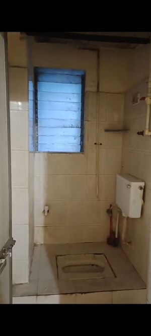 Bathroom in 1 BHK Apartment at Purushottam Plaza, Kasarvadavali – for Rent