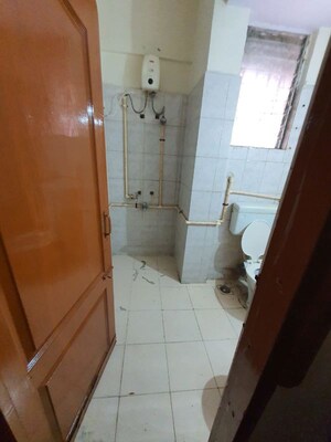 Bathroom in 2 BHK Apartment at Greenfield Rocks CHS, Jogeshwari East – for Rent