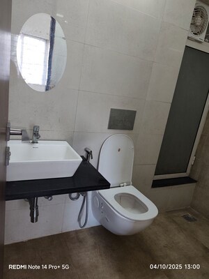 Bathroom in 1 BHK Apartment at Omkar Signet, Malad East – for Rent