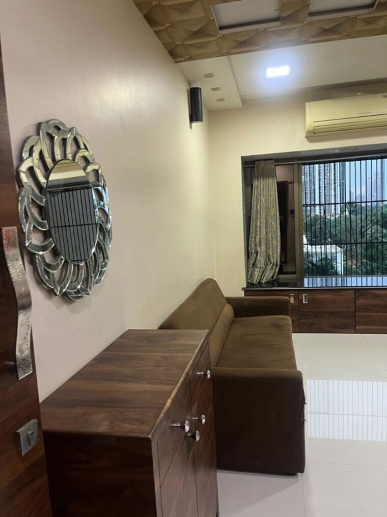 Living Room, lokhandwala-whispering-palms 1 Bedroom 645 Sq.Ft. Apartment In Kandivali East Mumbai 10569469