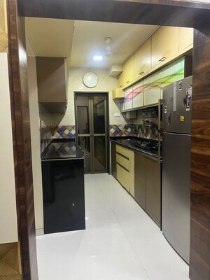 Kitchen in 1 BHK Apartment at Lokhandwala Whispering Palms, Kandivali East – for Sale