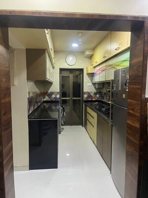 Kitchen in 1 BHK Apartment at Lokhandwala Whispering Palms, Kandivali East – for Sale