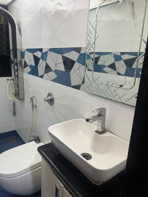 Bathroom in 1 BHK Apartment at Lokhandwala Whispering Palms, Kandivali East – for Sale