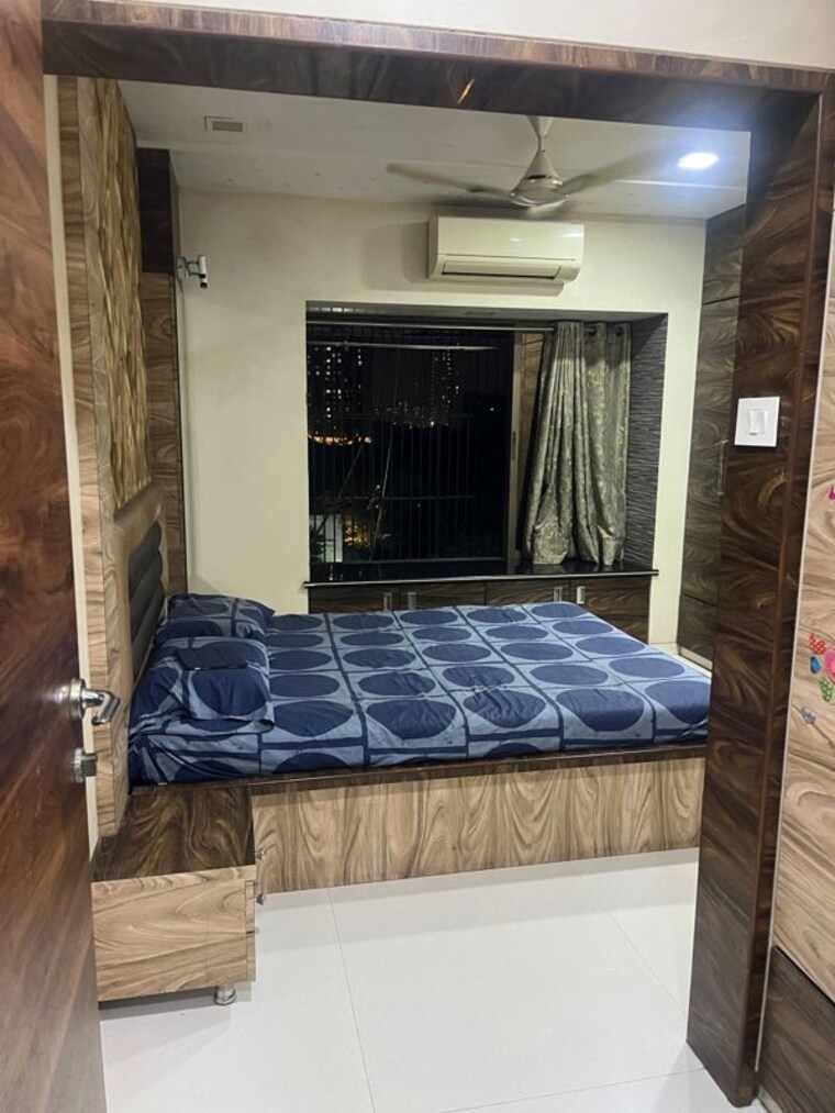 Bedroom, lokhandwala-whispering-palms 1 Bedroom 645 Sq.Ft. Apartment In Kandivali East Mumbai 10569469