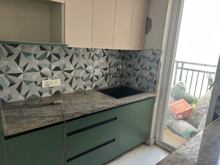 Kitchen, eldeco-live-by-the-greens 2 Bedroom 1137 Sq.Ft. Apartment In Sector 150 Noida 10569581