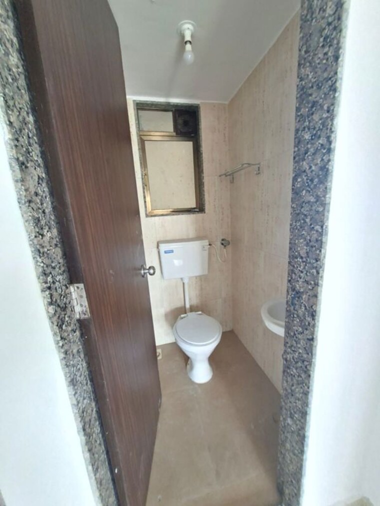 Bathroom, lotus-unity 2 Bedroom 550 Sq.Ft. Apartment In Versova Mumbai 10569591