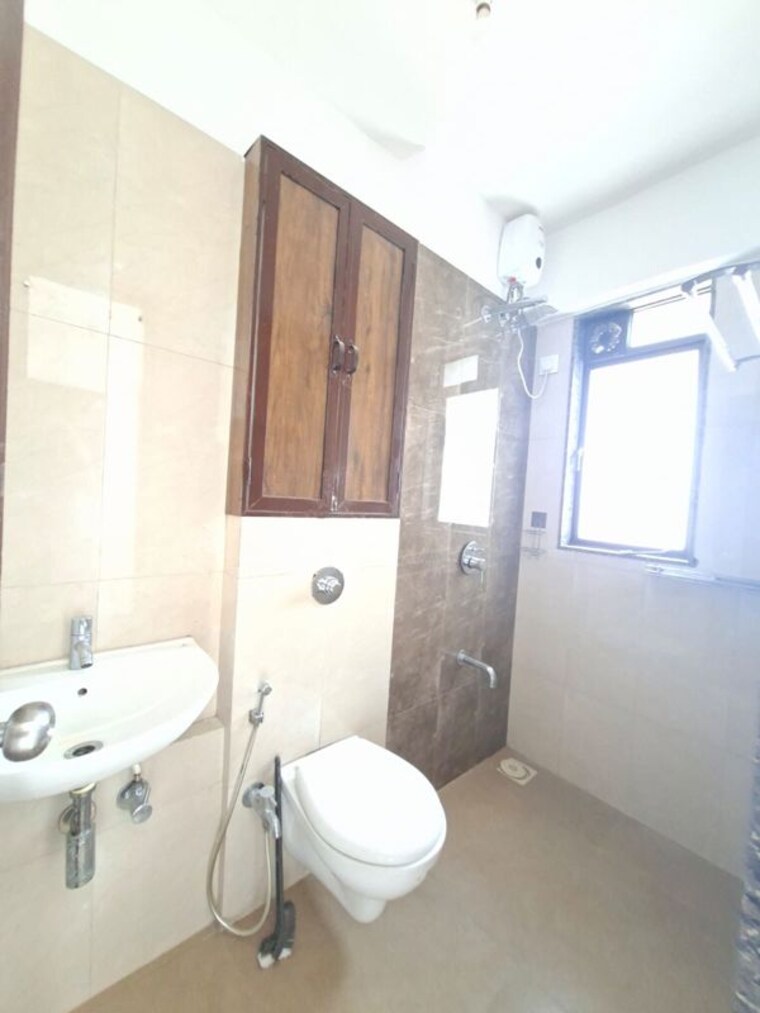 Bathroom, lotus-unity 2 Bedroom 550 Sq.Ft. Apartment In Versova Mumbai 10569591