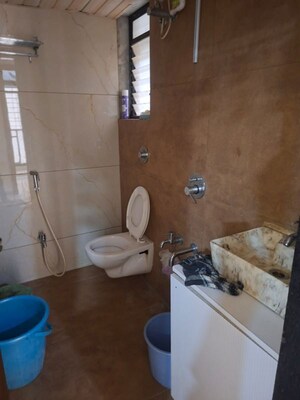 Bathroom in 1 BHK Apartment at Vihang Valley Phase 2, Kasarvadavali – for Rent