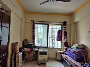 Living Room in 1 BHK Apartment at Iris CHS, Kasarvadavali – for Rent