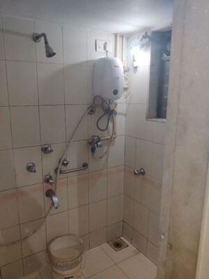 Bathroom in 1 BHK Apartment at Iris CHS, Kasarvadavali – for Rent