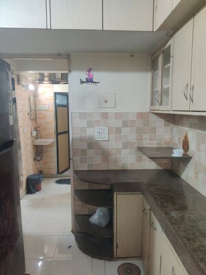 Kitchen in 1 BHK Apartment at Iris CHS, Kasarvadavali – for Rent