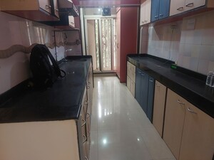 Kitchen in 4 BHK Apartment at Swastik Park CHS Goregaon, Goregaon West – for Sale