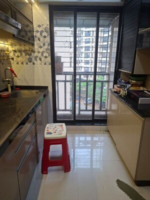 Kitchen in 1 BHK Apartment at Iris CHS, Kasarvadavali – for Rent