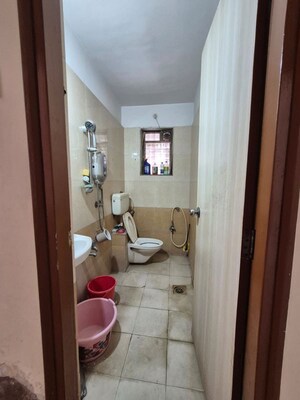 Bathroom in 1 BHK Apartment at Iris CHS, Kasarvadavali – for Rent
