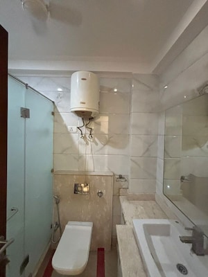 Bathroom in 3 BHK Builder Floor at Greater Kailash I – for Rent