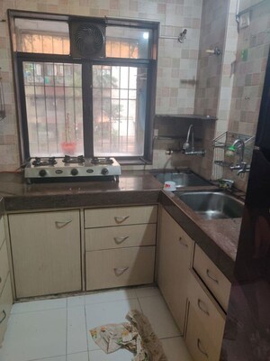 Kitchen in 1 BHK Apartment at Raunak 108, Kasarvadavali – for Rent